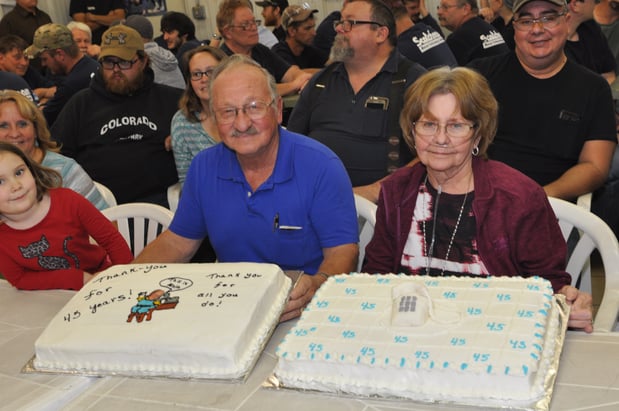 Alvin, his wife, and his two 45-year-anniversary cakes from Scotchman!